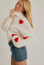 3D heart mock neck sweater